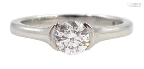 Platinum single stone round brilliant cut diamond, half beze...