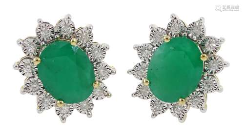 Pair of 9ct gold oval emerald and diamond cluster stud earri...