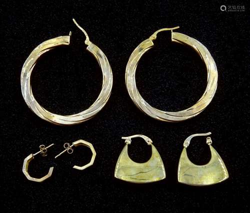 Pair of gold hoop earrings and two other pairs of gold earri...