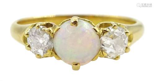 Gold three stone round opal and old cut diamond ring