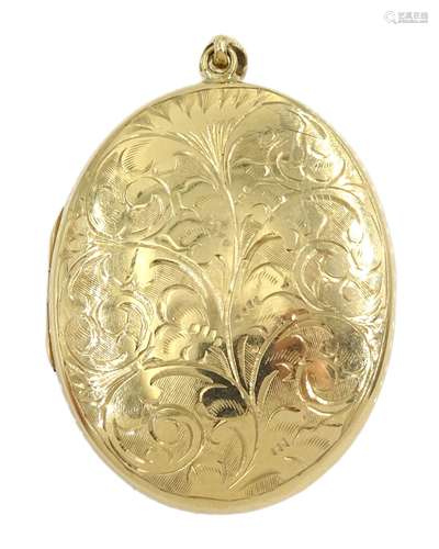 9ct gold oval locket with engraved decoration