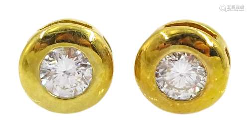 Pair of 18ct gold diamond rubover set earrings