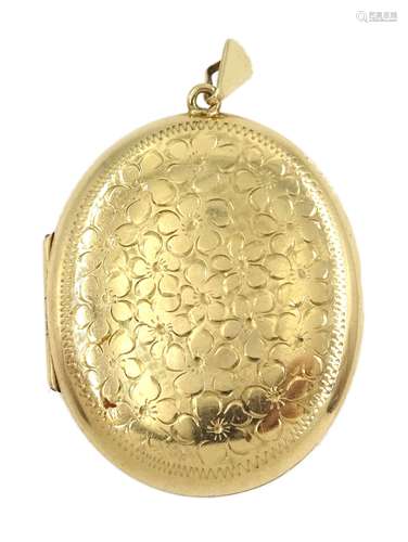 9ct gold oval locket with engraved flower decoration