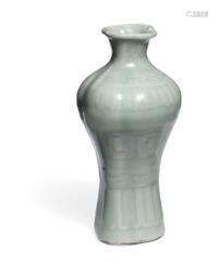 A Chinese celadon vase of quatrefoil shape. Qianlong seal ma...