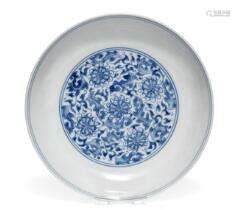 A blue and white peony saucer-dish, Yongzheng six-character ...