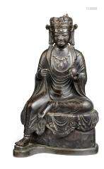 A patinated bronze figure of the bodhisattva Kṣitigarbha. Pr...