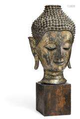 Buddha head of partly gilt bronze. Laos, 17/18th century. H ...