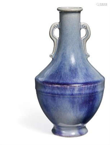 An 18th c. Qing flambé glazed porcelain flask vase. H. 21.5 ...