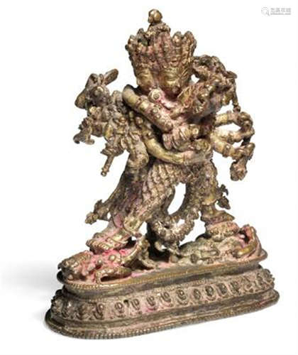 A Nepali gilt bronze figure of Chakrasamvara and Vajravarahi...