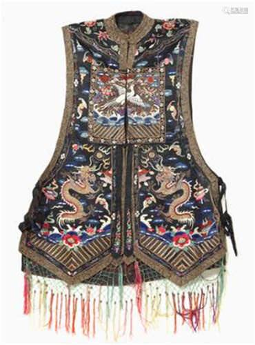 A Chinese silk wedding vest. Xiapei, c. 1900. L. c. 85 cm.