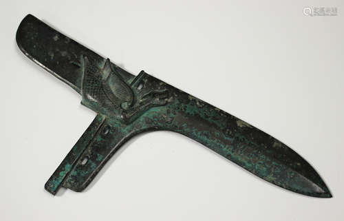 A Chinese archaistic bronze dagger axe, covered in a verdigr...