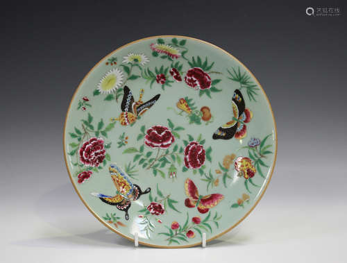 A Chinese Canton famille rose enamelled celadon ground porce...