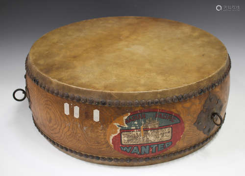 A Japanese drum, mid-20th century, the elm body with metal m...