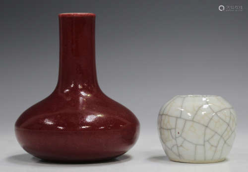 A Chinese sang-de-boeuf glazed bottle vase, mark of Qianlong...