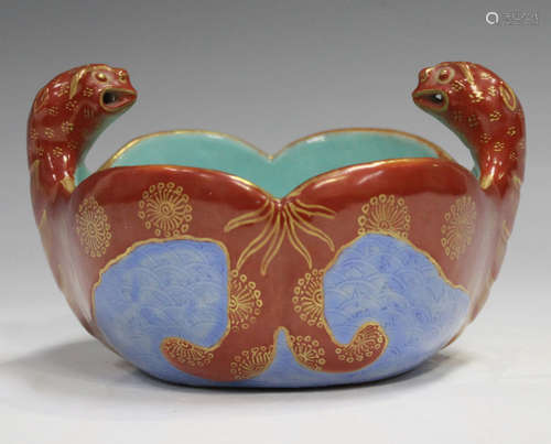 A Chinese moulded 'twin bat' porcelain bowl, mark of Daoguan...