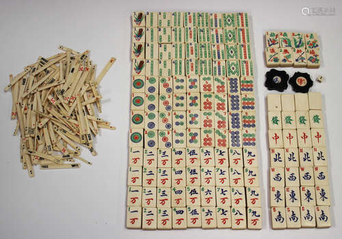 A Chinese Mahjong set, early 20th century, with bone and bam...