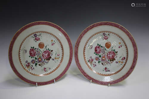 A pair of Chinese famille rose export porcelain plates, Qian...