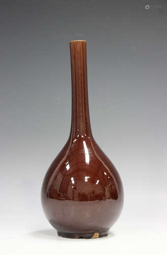 A Chinese brown glazed bottle vase, Qing dynasty, the ovoid ...