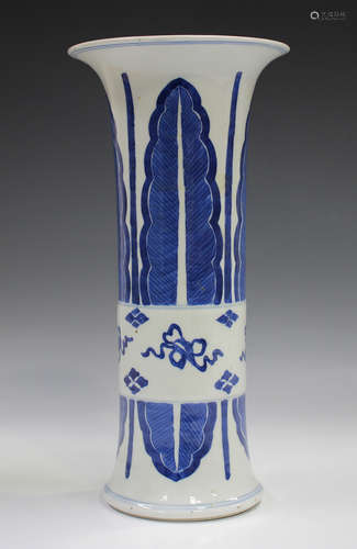 A Chinese blue and white porcelain beaker vase, Kangxi style...