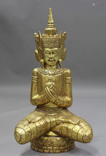 A Thai giltwood Buddha, late 20th century, carved seated in ...