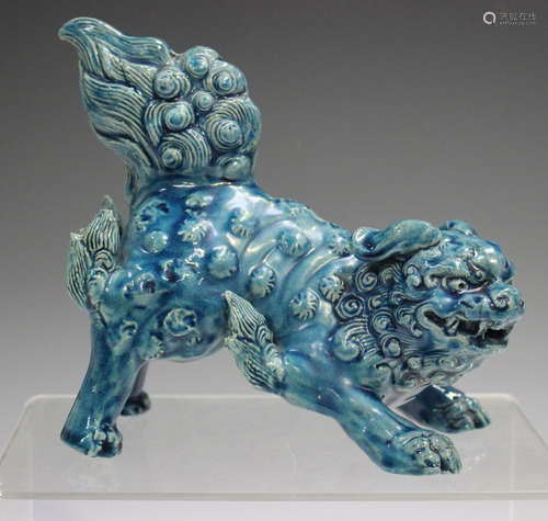 A Chinese turquoise glazed figure of a Buddhistic lion, late...