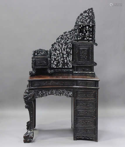 A Chinese hardwood single pedestal writing desk, late Qing d...