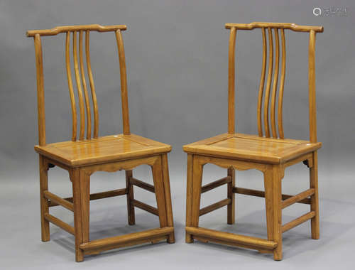 A pair of Chinese provincial softwood chairs, 20th century, ...