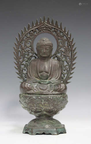 A Japanese bronze Buddha, 20th century, modelled seated in d...