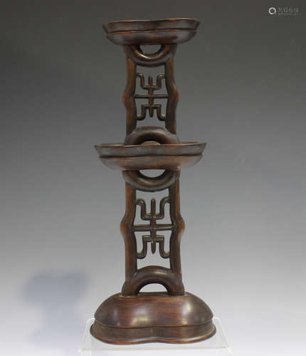 A Chinese hardwood stand, 20th century, the pierced and carv...