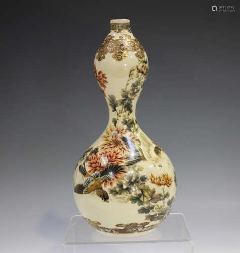 A Japanese Satsuma earthenware double gourd shaped vase, Mei...