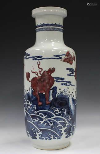 A Chinese underglaze blue and iron red porcelain rouleau vas...