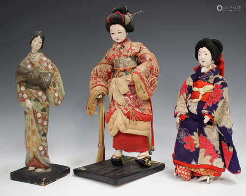 A Japanese geisha doll, early 20th century, with lacquered h...