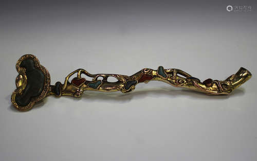 A Chinese gilt copper and hardstone set ruyi sceptre, the na...