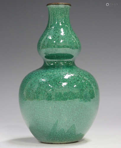 A Chinese green crackle glazed double gourd shaped vase, cov...