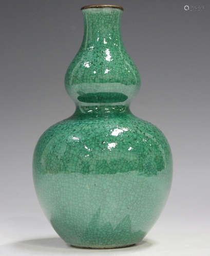 A Chinese green crackle glazed double gourd shaped vase, cov...