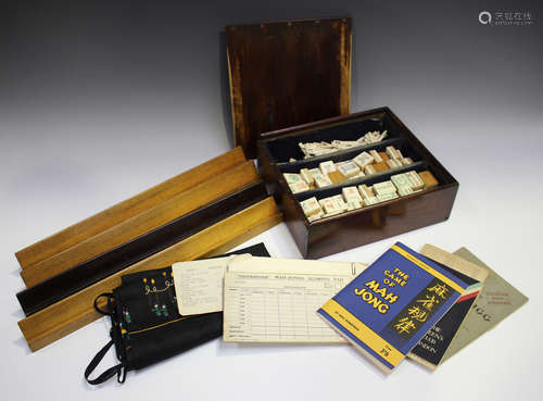 A Chinese Mahjong set, early 20th century, with bone and bam...