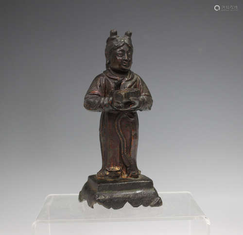 A Chinese lacquered bronze figure of a standing court attend...