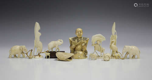 A small group of Chinese and Japanese ivory and bone carving...