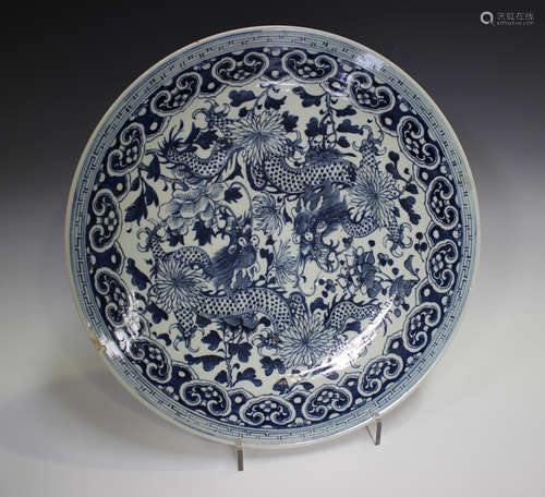 A Chinese blue and white porcelain circular charger dish, la...