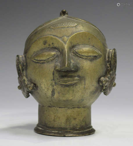 A Indian bronze head of Parvati, modelled with eyes closed, ...