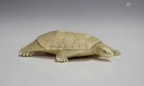 A Japanese carved ivory okimono figure of a tortoise, Meiji ...