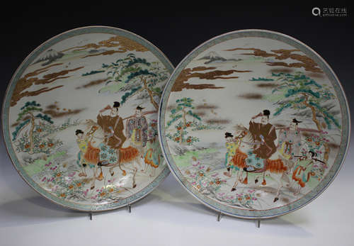 A pair of Japanese Arita porcelain chargers, Meiji period, e...