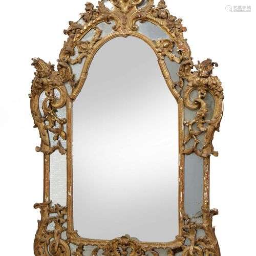 MIROIR AU MERCURE DANS UN CADRE en bois sculpté, m…