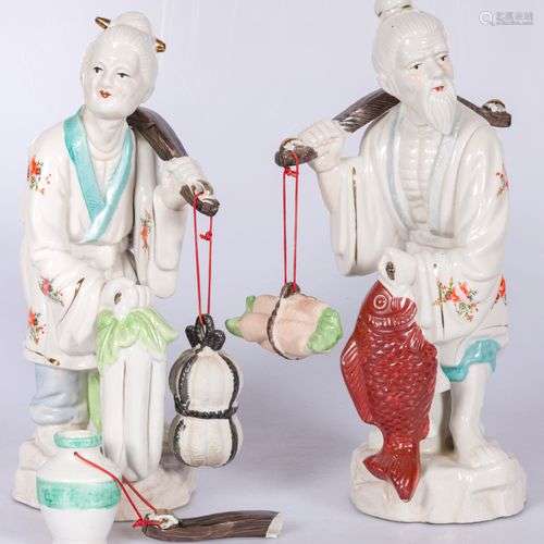 A set of (2) porcelain Asian figures with yoke on the should...