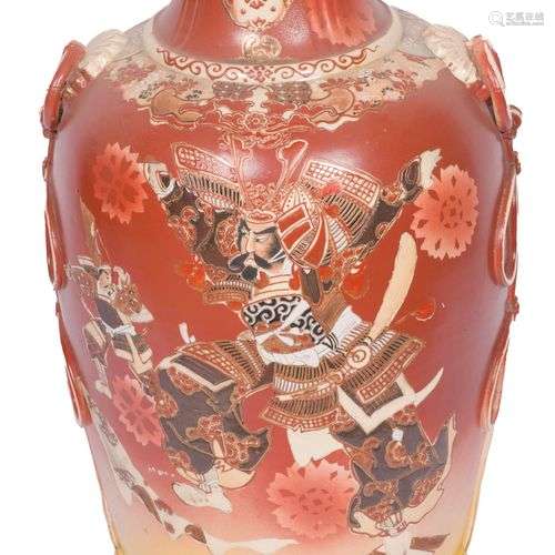 A Satsuma earthenware vase decorated with various figures, J...