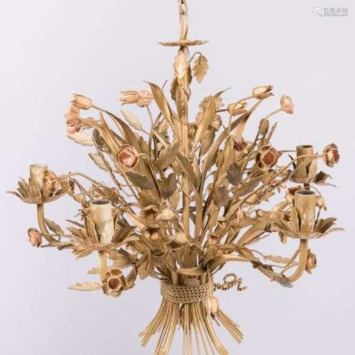 A gold painted pendant chandelier, bouquet of flowers, mid. ...