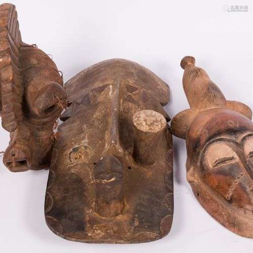 A lot comprising of (3) West African masks, 20th century.