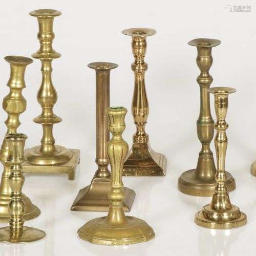 A lot comprising (10) copper candle holders, 19th century an...