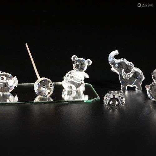 (7) piece lot of Swarovski miniatures.