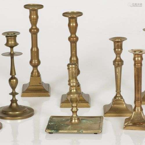 A lot of (4) pairs of bronze candle holders and one separate...